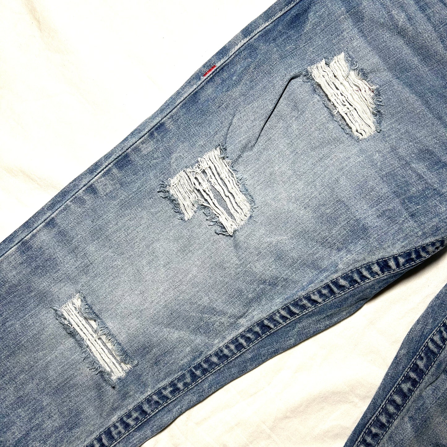 True Religion Distressed Straight Jeans w/ 'TR' Patchwork Embroidery