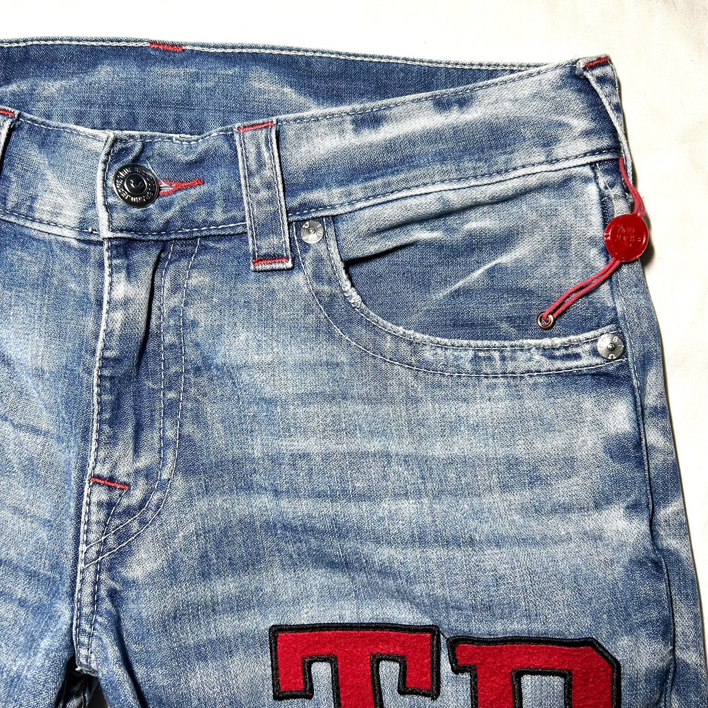 True Religion Distressed Straight Jeans w/ 'TR' Patchwork Embroidery